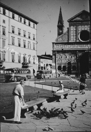 FEEDING THE PIGEONS  IN THE PIAZZA MINERVA